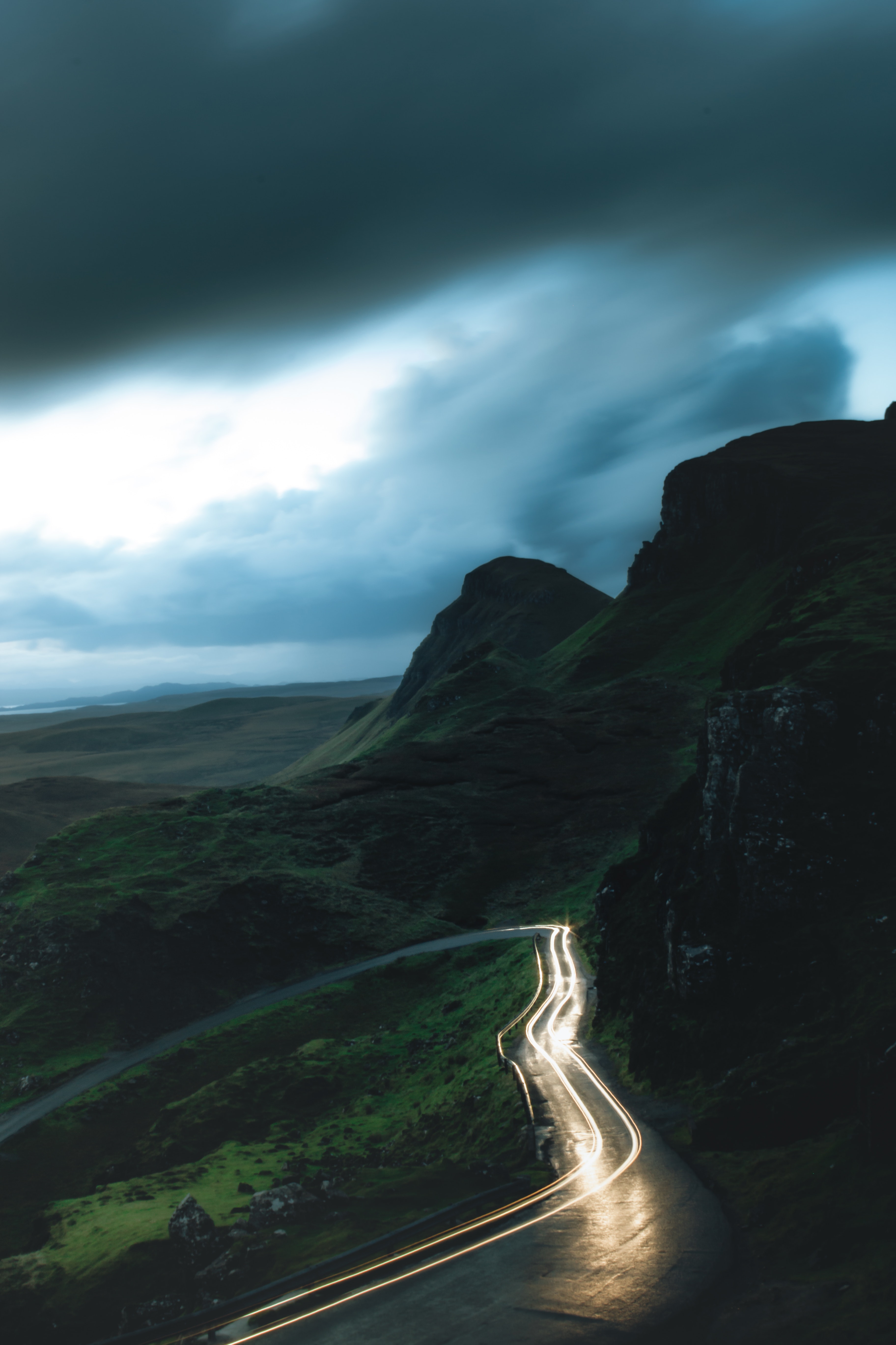 lighted-car-in-winding-road-2324925